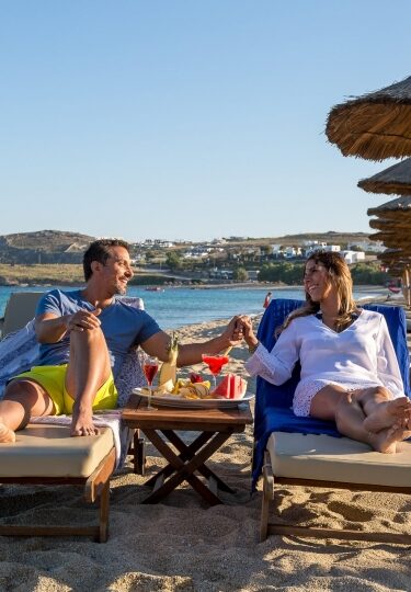 A couple enjoying a sunny day on the Mediterranean coast